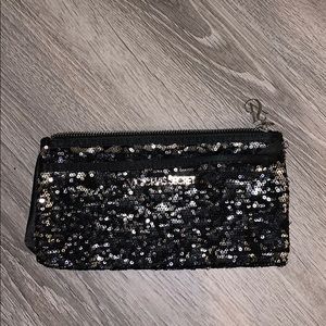 Victoria’s Secret make up pouch or a little clutch